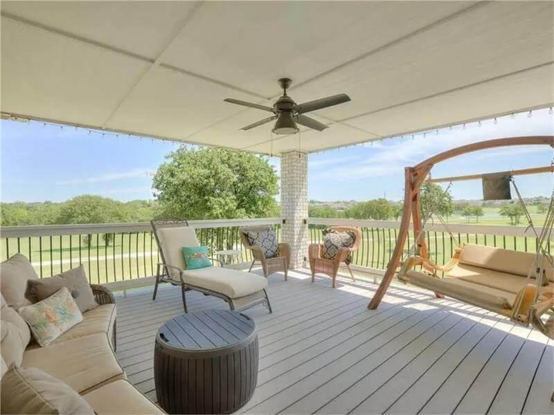 Covered Patio with Serene Views and a Cozy Hammock Swing