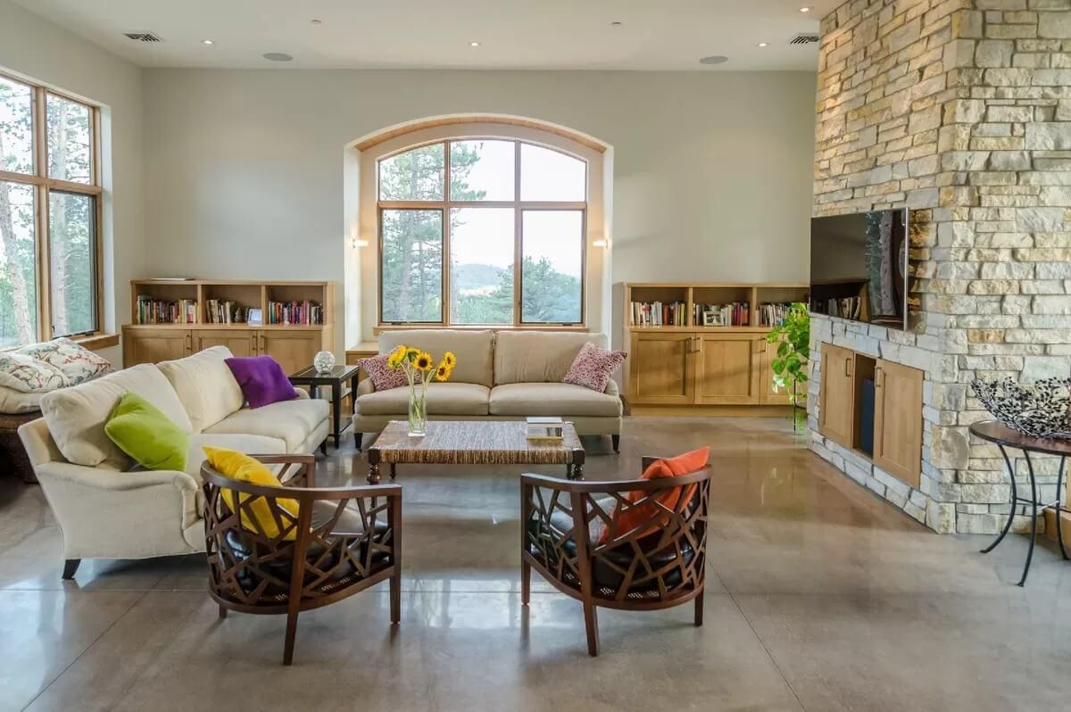 Wow, Look at the Stone Fireplace and Colorful Accents in This Living Area