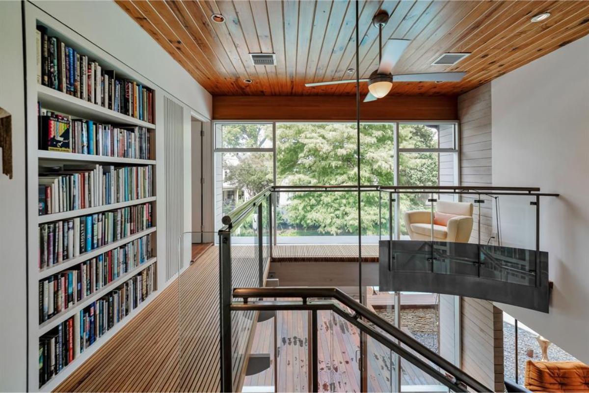 Wow, This Cozy Loft with a Home Library Is Stunning