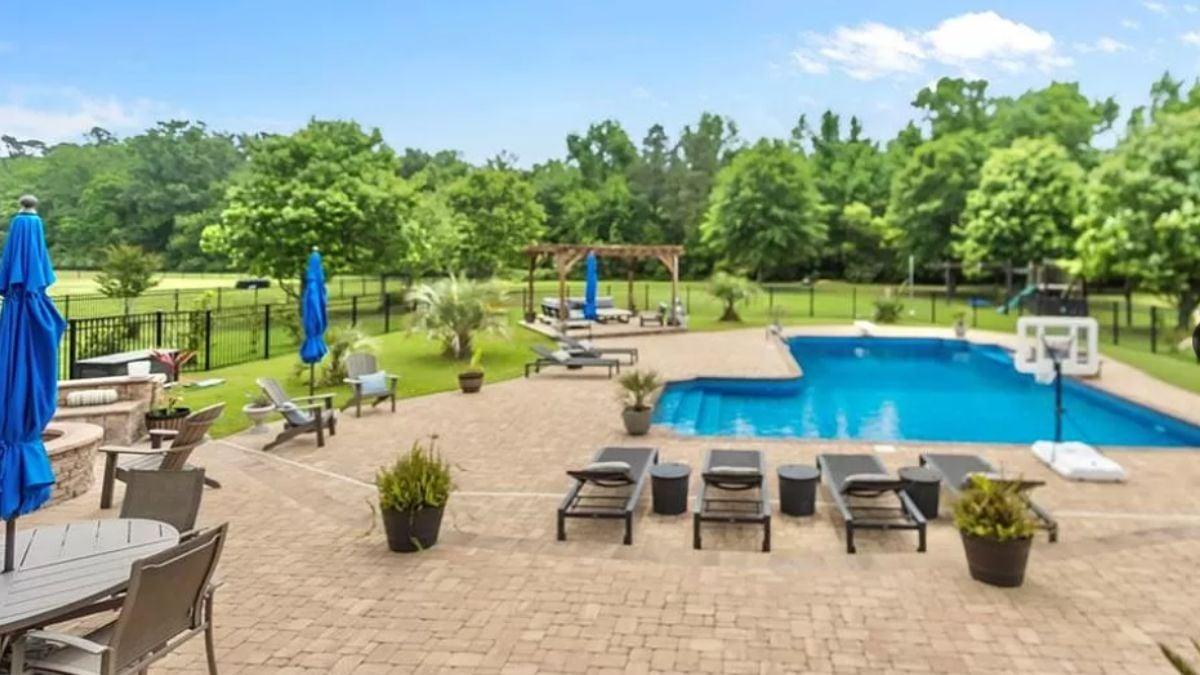 Relax by the Pool with This Expansive Lounge Area