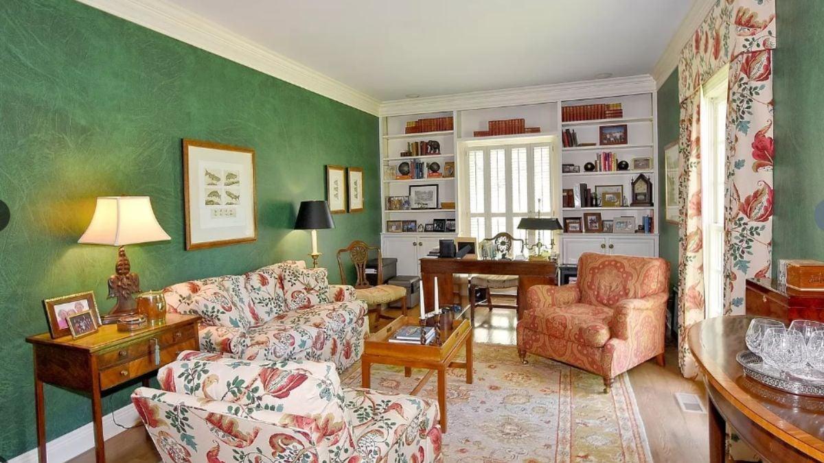 Florals Galore in This Vibrant Living Room with Green Walls
