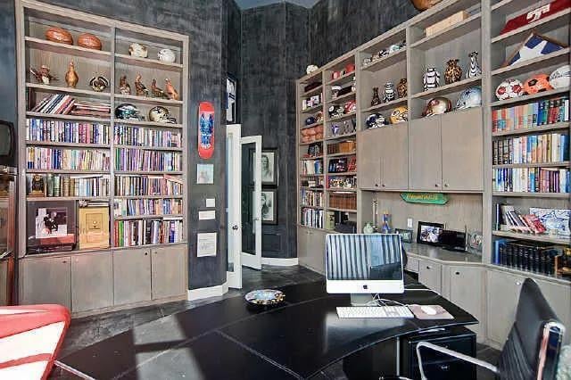 Home Office with Eye-Catching Built-In Shelving Display