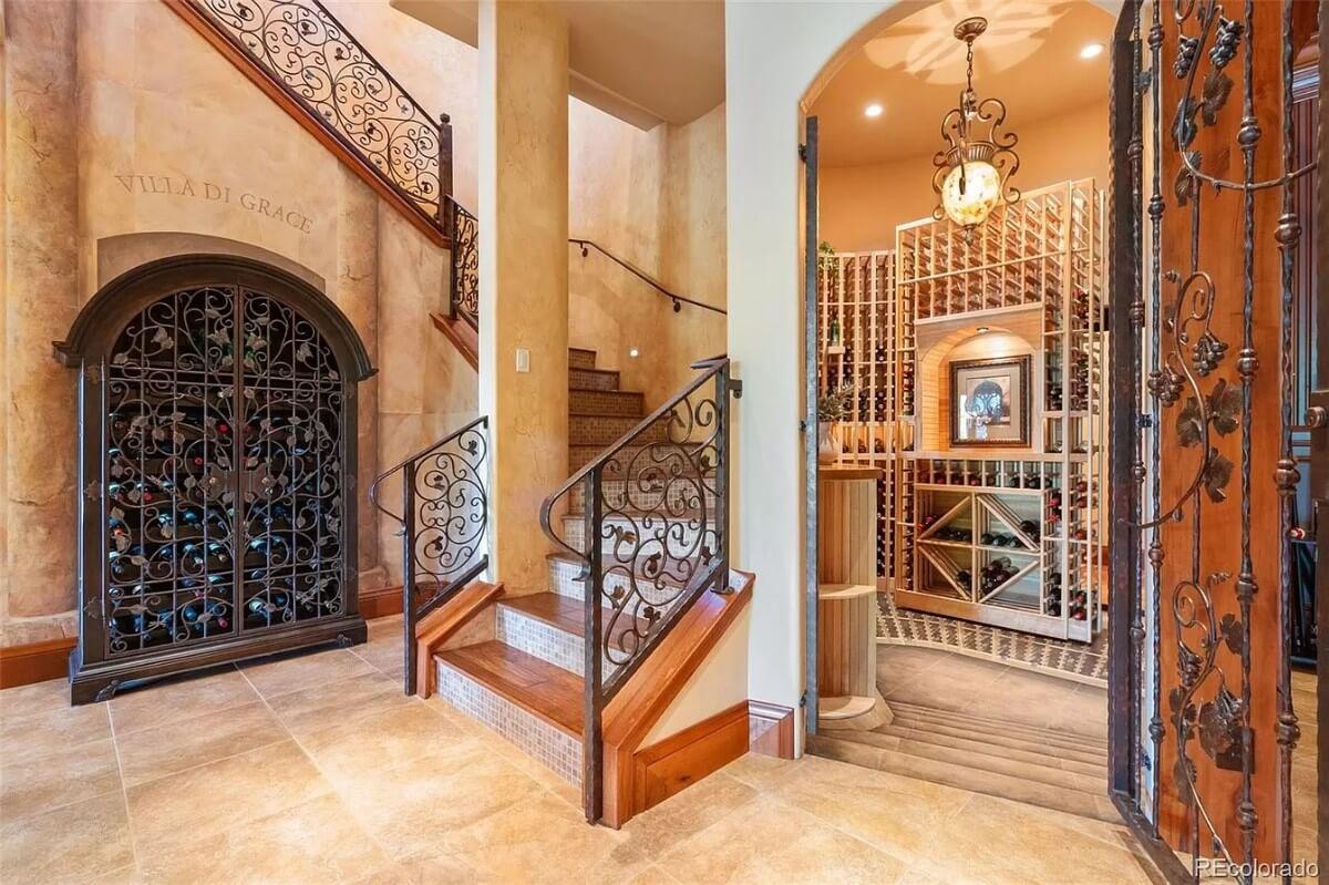 Check Out the Ornate Ironwork in This Wine Cellar Entrance