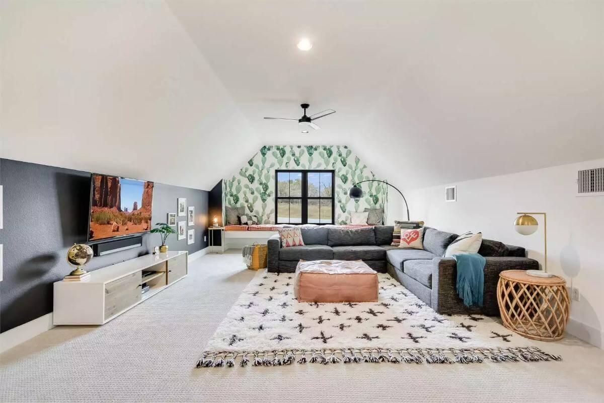 Admire the Bold Cactus Wallpaper Adding Flair to This Attic Lounge