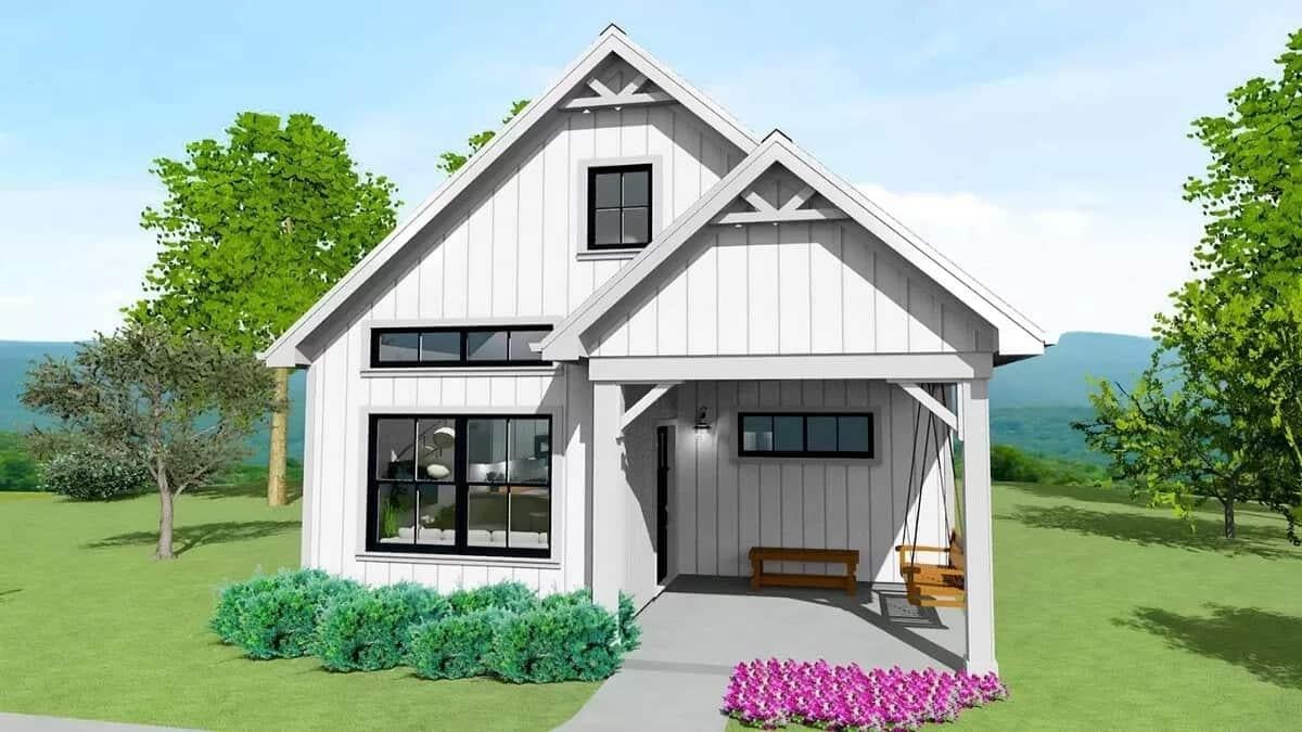 Charming Cottage with a Classic Gable Roof and Inviting Front Porch