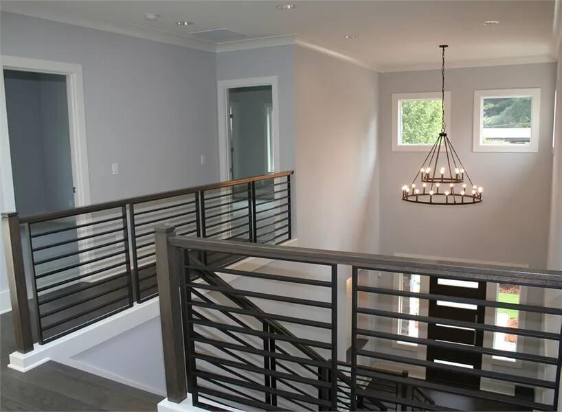 Airy Landing with Elegant Candle-Style Chandelier