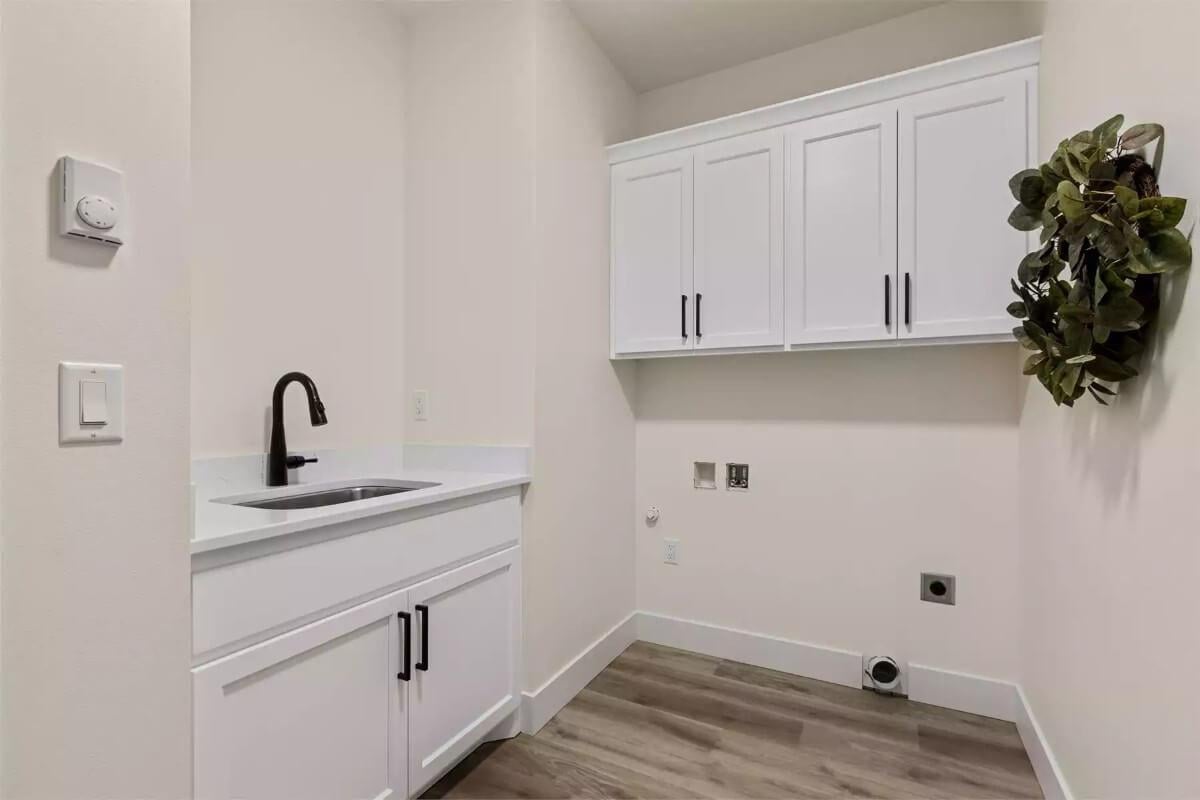 Functional Laundry Room with Matte Black Fixtures