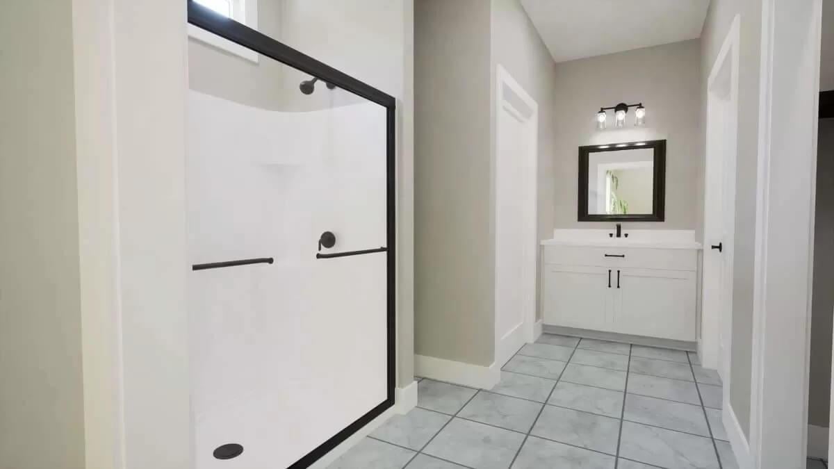 Spot the Contrasting Black Trim in This Minimalist Bathroom