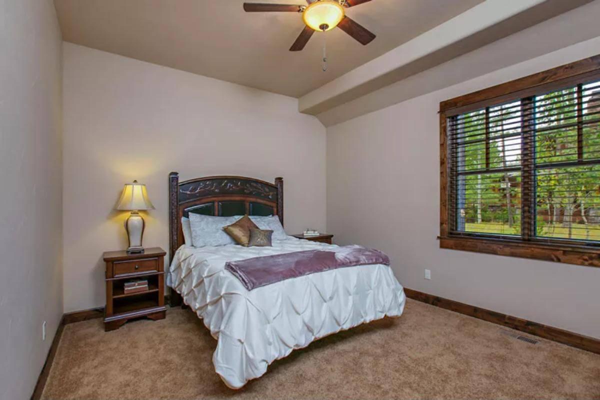 Cozy Craftsman Bedroom with a Charming Wooden Headboard