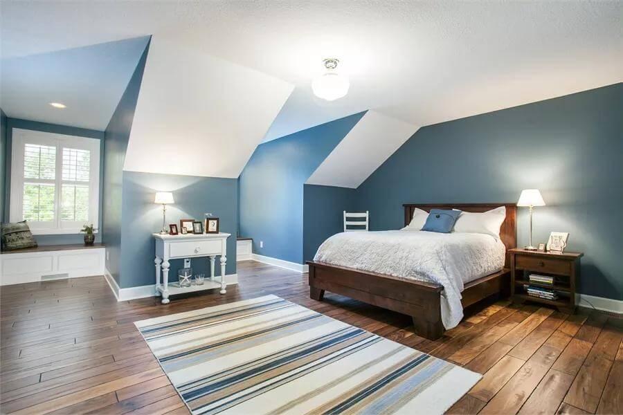 Check Out This Cozy Attic Bedroom with a Charming Window Seat