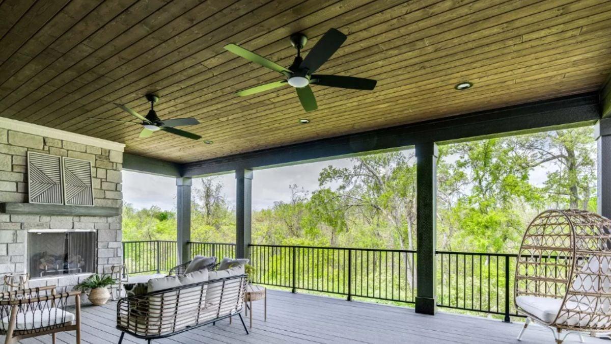 Notice the Bold Ceiling Fans on This Expansive Covered Deck