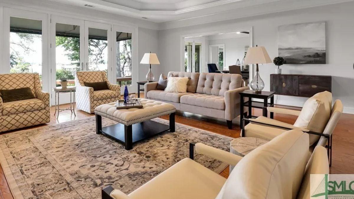 Spacious Living Room with Plush Seating and Intricate Rug