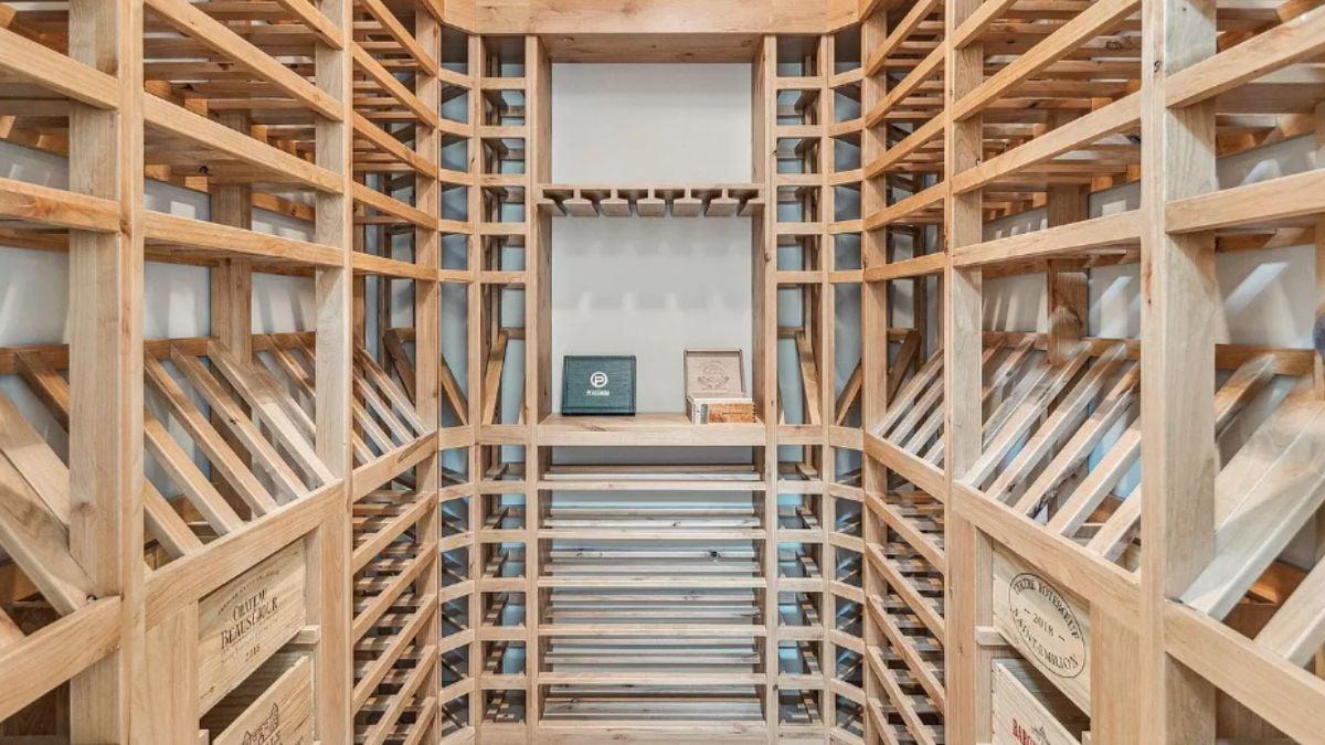 Explore the Crafted Wooden Racks in This Dedicated Wine Room