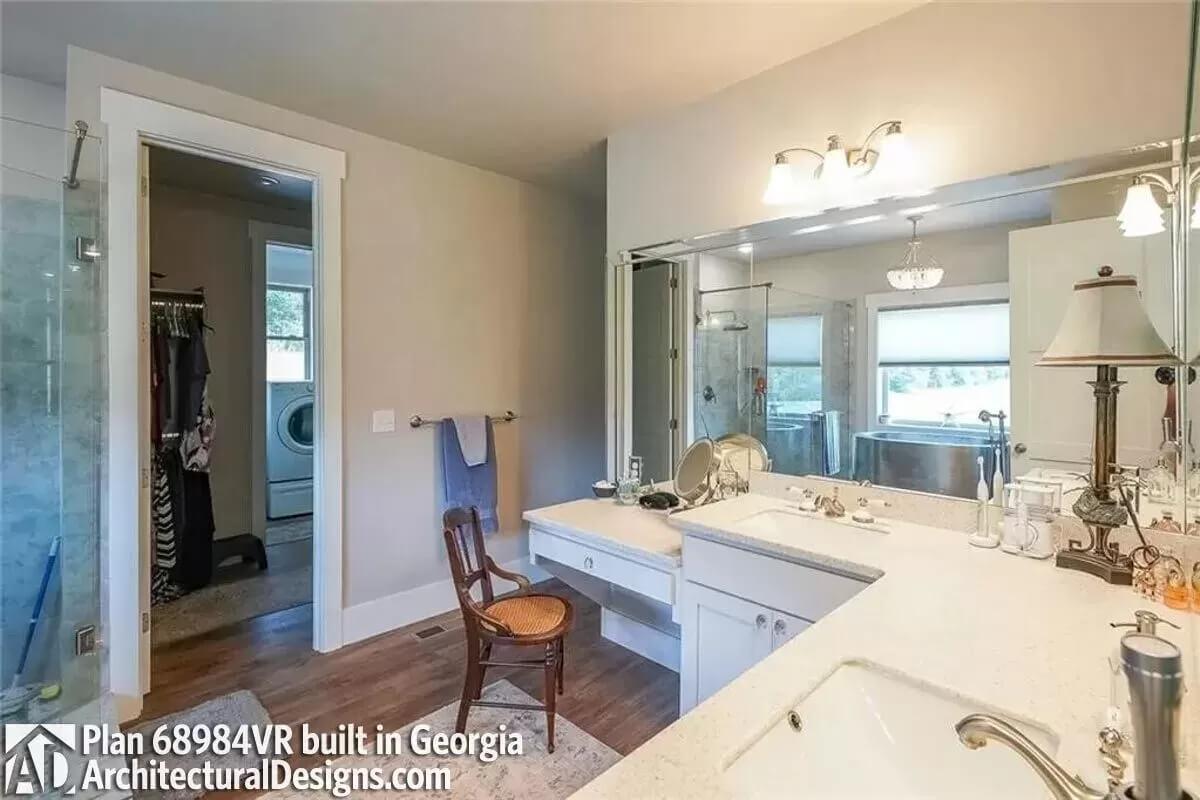 Practical Luxury in the Bathroom: Built-in Vanity and Laundry Access