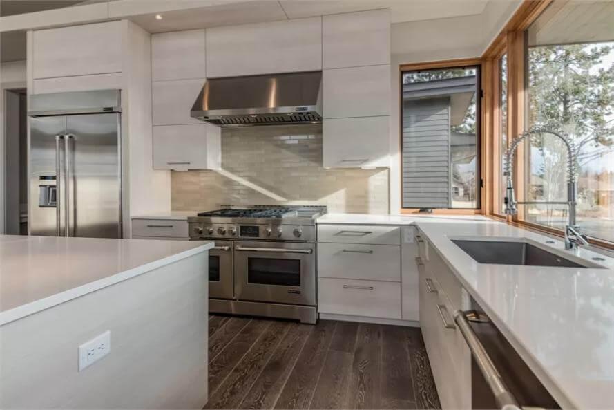 Check Out the Sleek Stainless Steel Accents in This Modern Kitchen