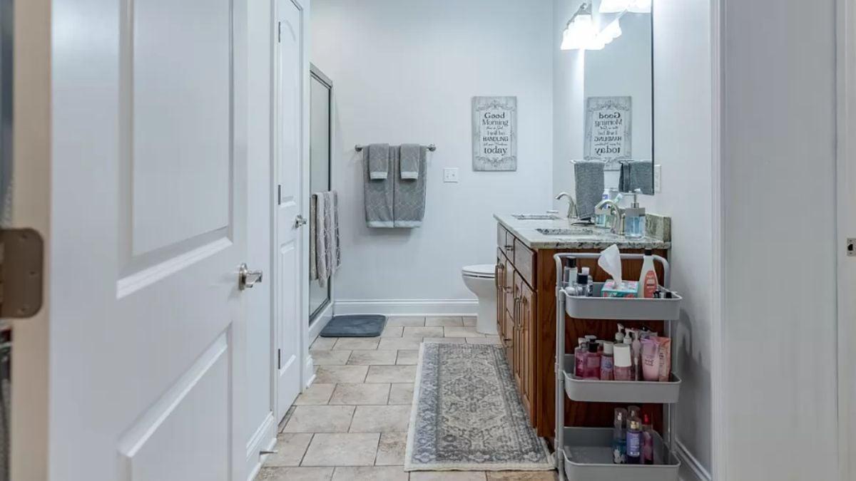 Functional Bathroom Layout with Handy Rolling Cart