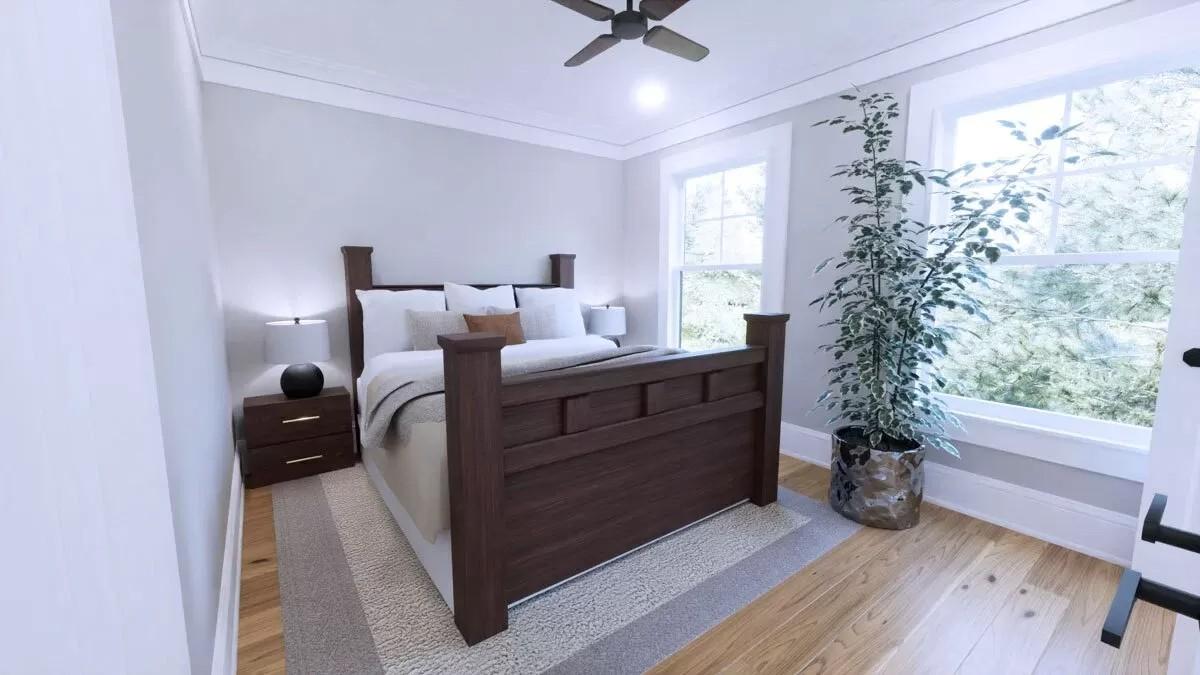 Sunlit Bedroom Featuring a Rich Wood Bed Frame