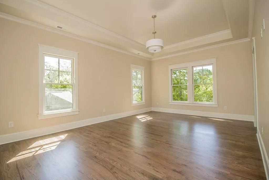 Bright Room with Tray Ceiling and Gleaming Floors