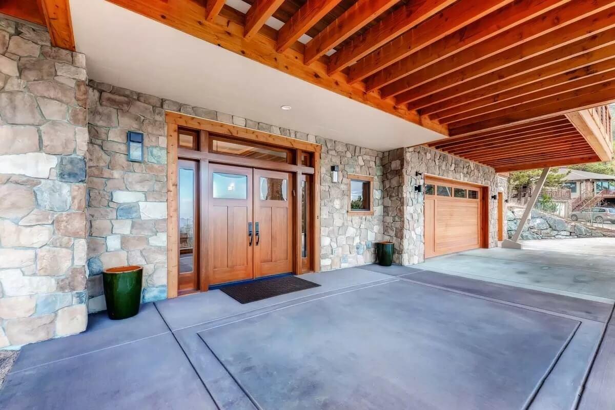 Notice How the Wood Detailing Complements the Stonework at This Entrance