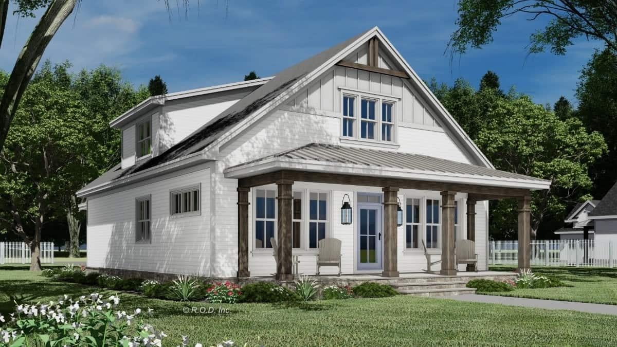 Charming Farmhouse with Inviting Front Porch and Gabled Roof