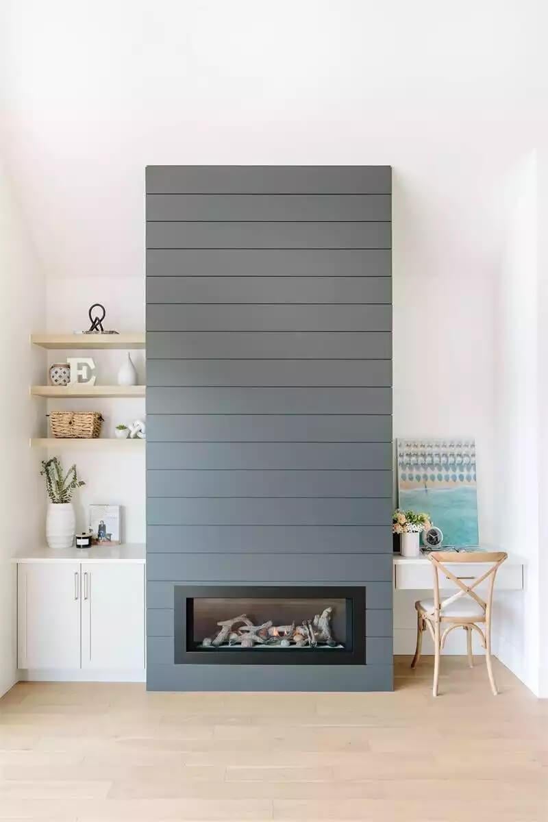 Check Out the Sleek Shiplap Fireplace and Built-In Shelving