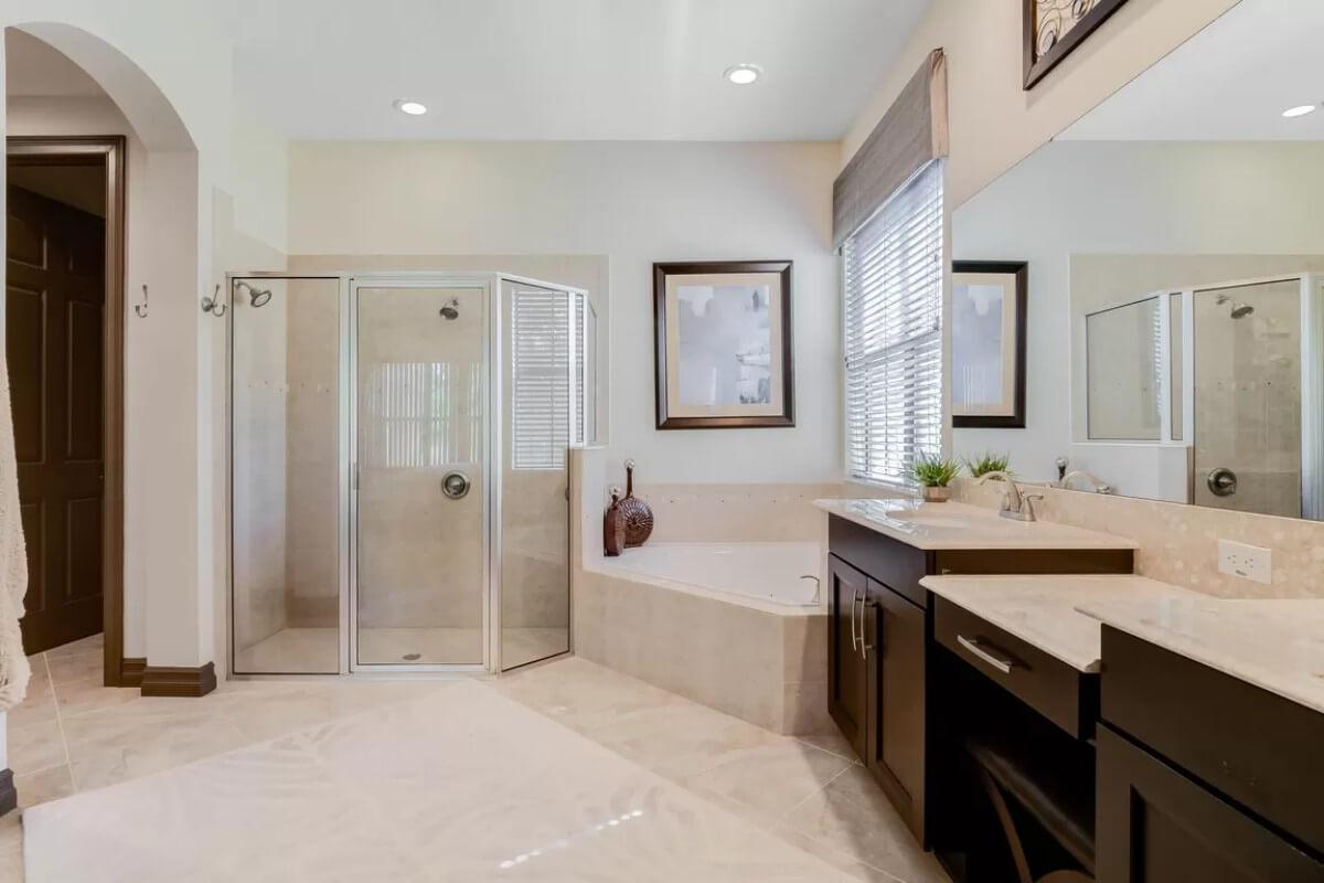 Sleek Bathroom Design with a Walk-In Shower and Luxurious Tub