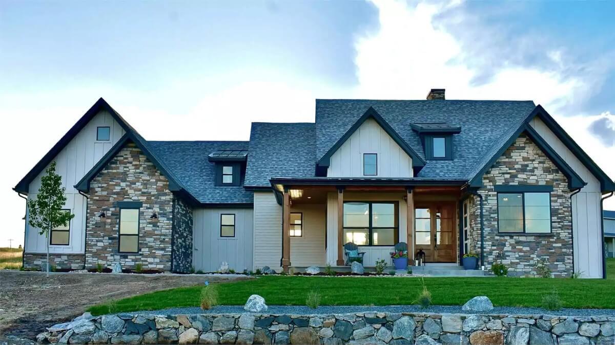 Modern Farmhouse Charm with Stone Accents and Dormer Windows