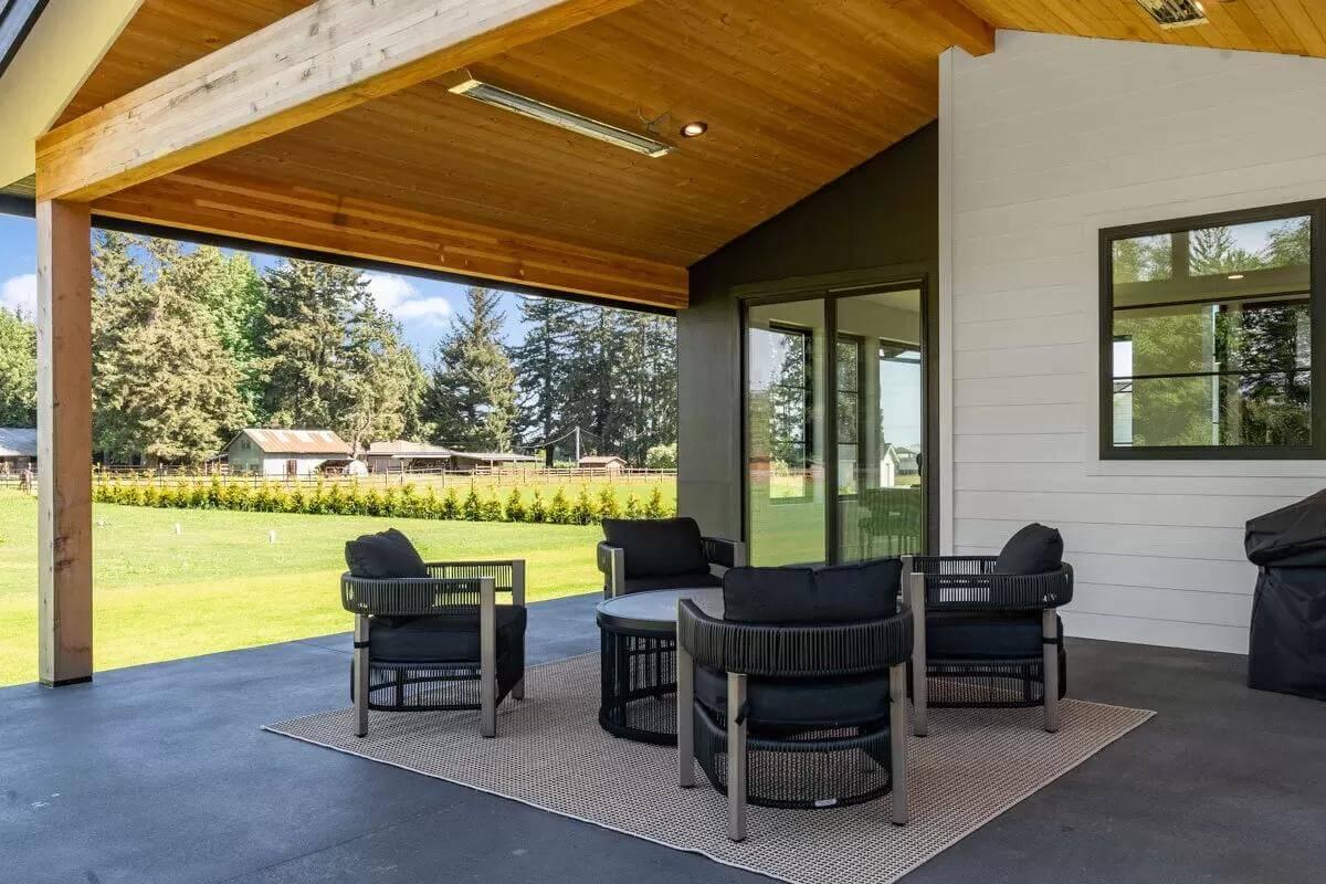 Covered Patio with a Cozy Seating Area and Rural Views