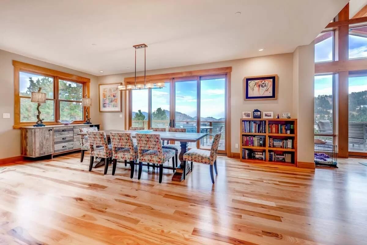 Look at the Gorgeous Hardwood Floors and Vibrant Dining Chairs