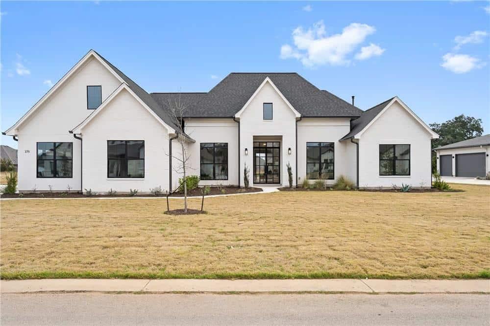 Modern Farmhouse Exterior with Striking Black Accents