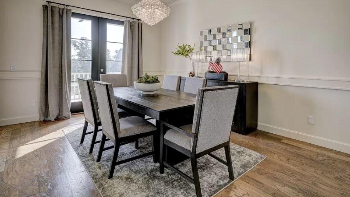 Notice the Dramatic Chandelier Illuminating This Dining Room