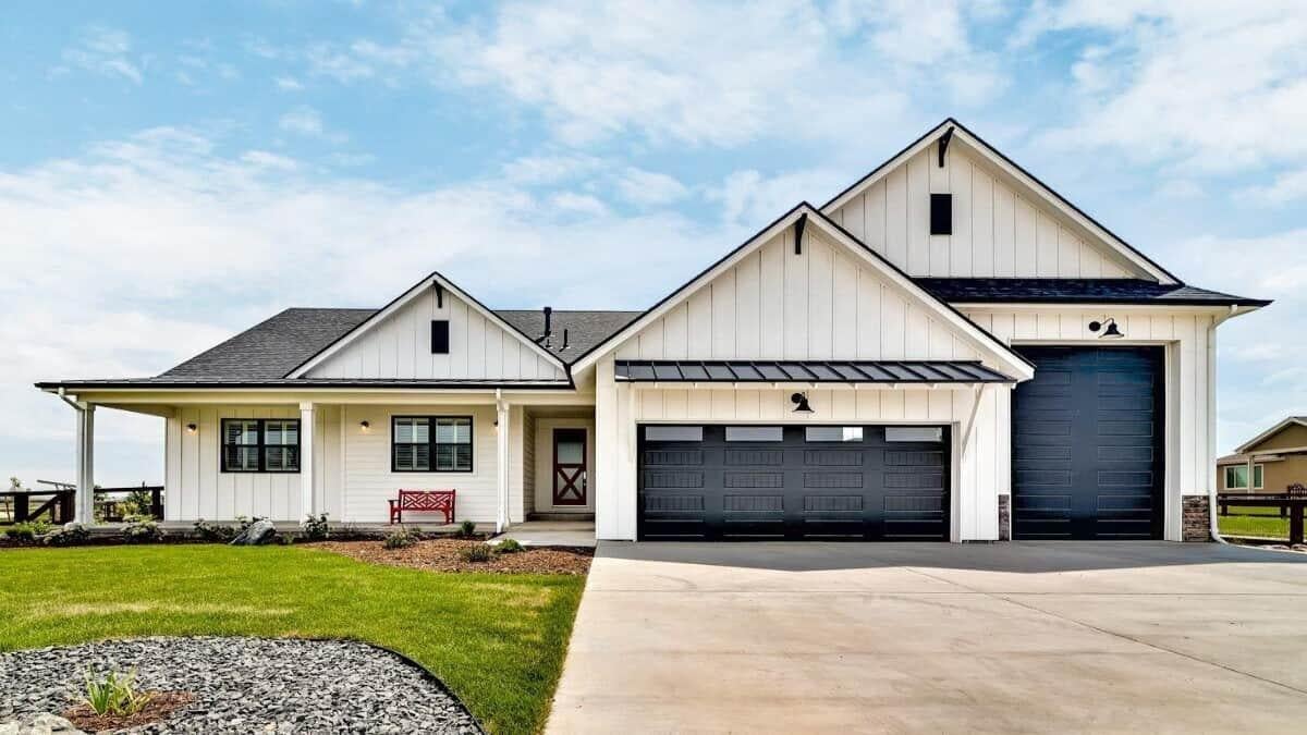 Modern Farmhouse with Striking Contrasting Garage Doors