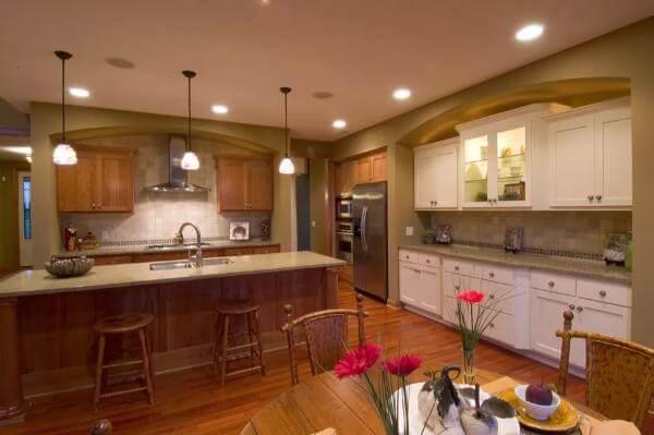 Warm Craftsman Kitchen with a Dreamy Island and Pendant Lights