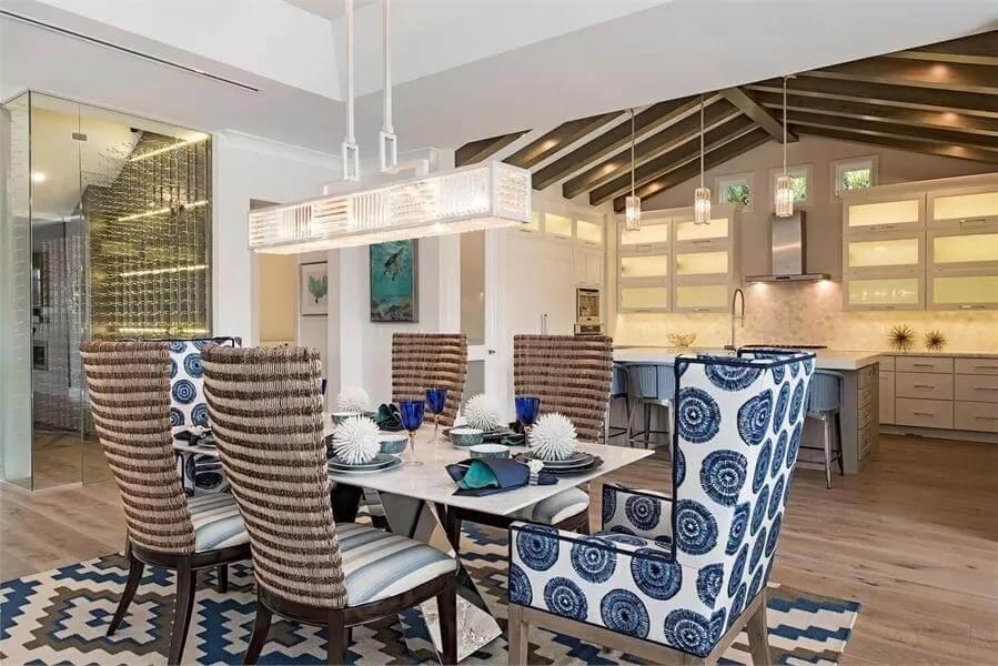 Eclectic Dining Space with Bold Patterns and Vaulted Ceilings