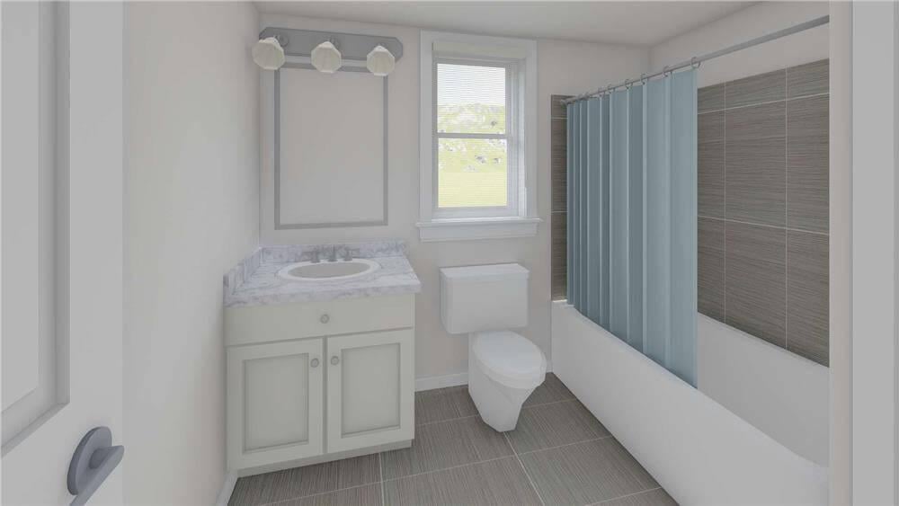Notice the Light and Airy Feel of This Bathroom with Its Soft Blue Accents