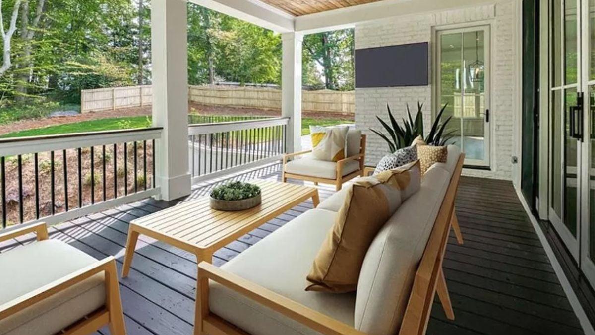 Relax on a Craftsman Porch with Modern Furnishings and Lush Views