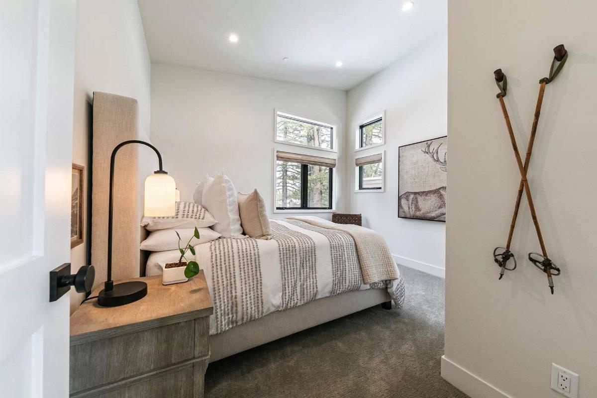 Spot the Classic Ski Decor That Adds a Playful Touch to This Cozy Bedroom