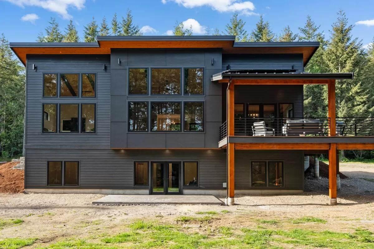 Wow, Look at the Bold Contrast and Expansive Windows on This Modern Home