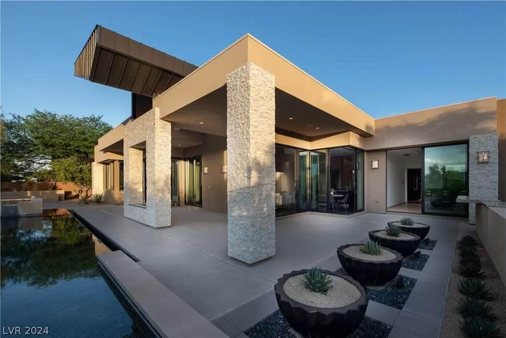 Striking Covered Terrace with Textured Stone Columns