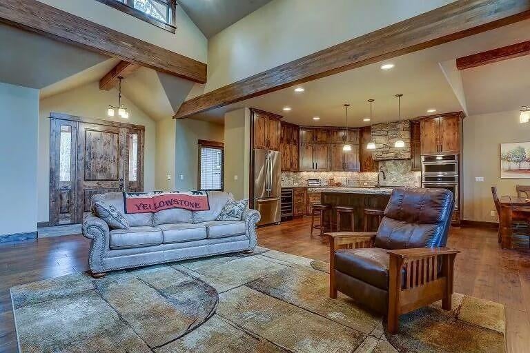 Open Concept Living Area with Striking Wooden Beams