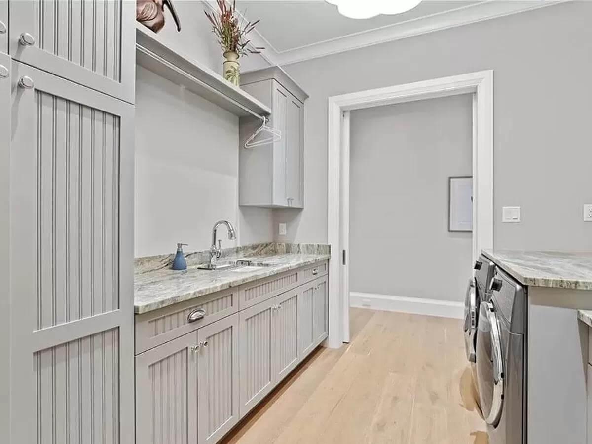 Spotlight on the Thoughtfully Designed Laundry Room with Beadboard Cabinets