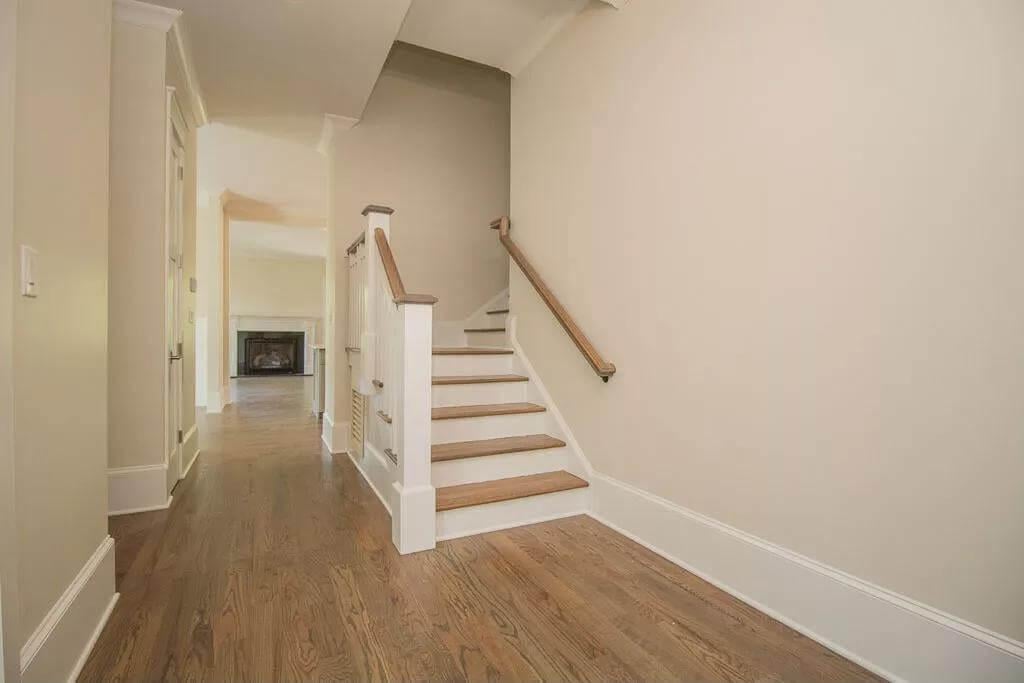 Timeless Staircase with Elegant Wooden Treads and Classic Railings