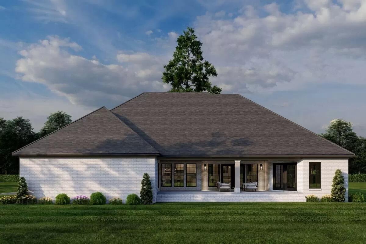 Expansive Backyard View Showcasing a Charming Covered Porch