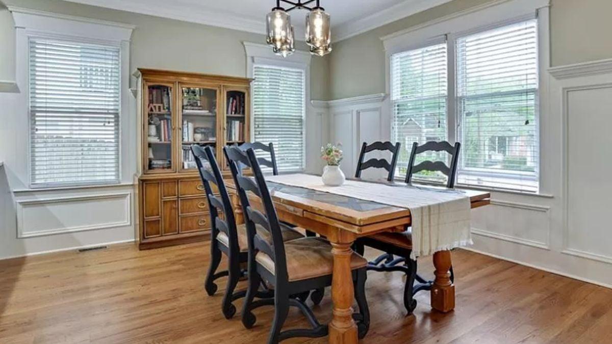 Craftsman Dining Room with Stately Black Ladder-Back Chairs