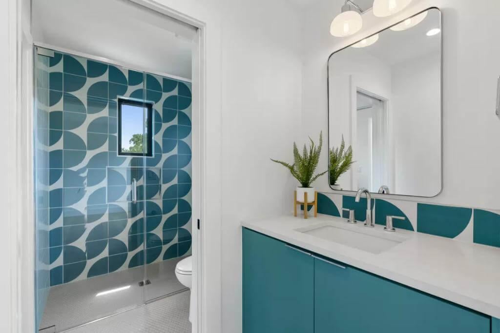 Notice the Bold Geometric Tiles in This Vibrant Bathroom