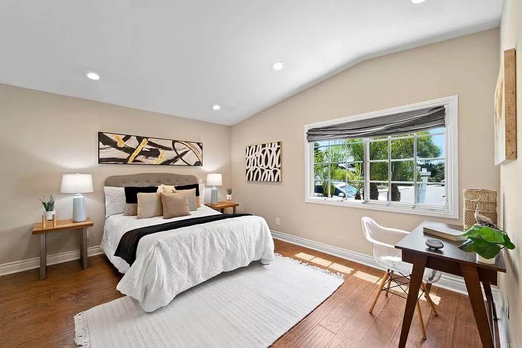 Warm Bedroom Retreat with Artistic Touches and Natural Light