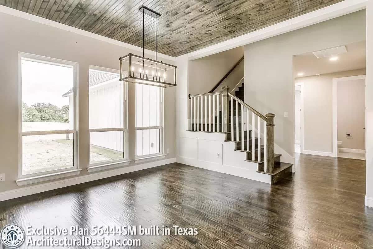 Rustic Ceiling Takes Center Stage in This Bright Foyer