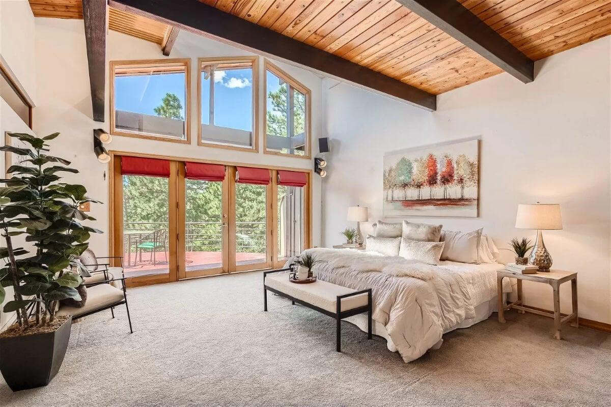 Breathtaking Vaulted Ceiling in This Sun-Drenched Bedroom
