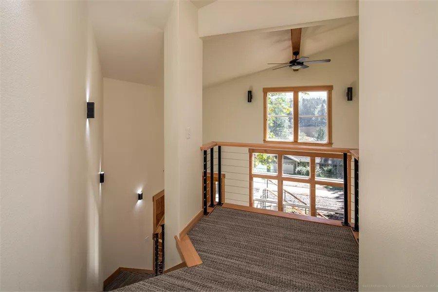 Wow, Notice the Dramatic Vaulted Ceilings and Sleek Railings
