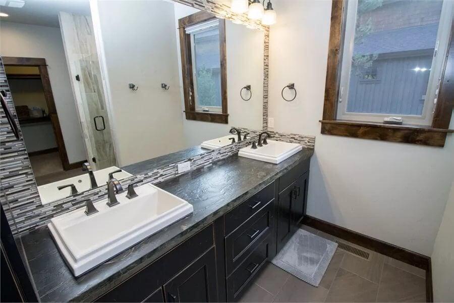 Stylish Bathroom Vanity With Dual Sinks and a Sleek Tile Backsplash